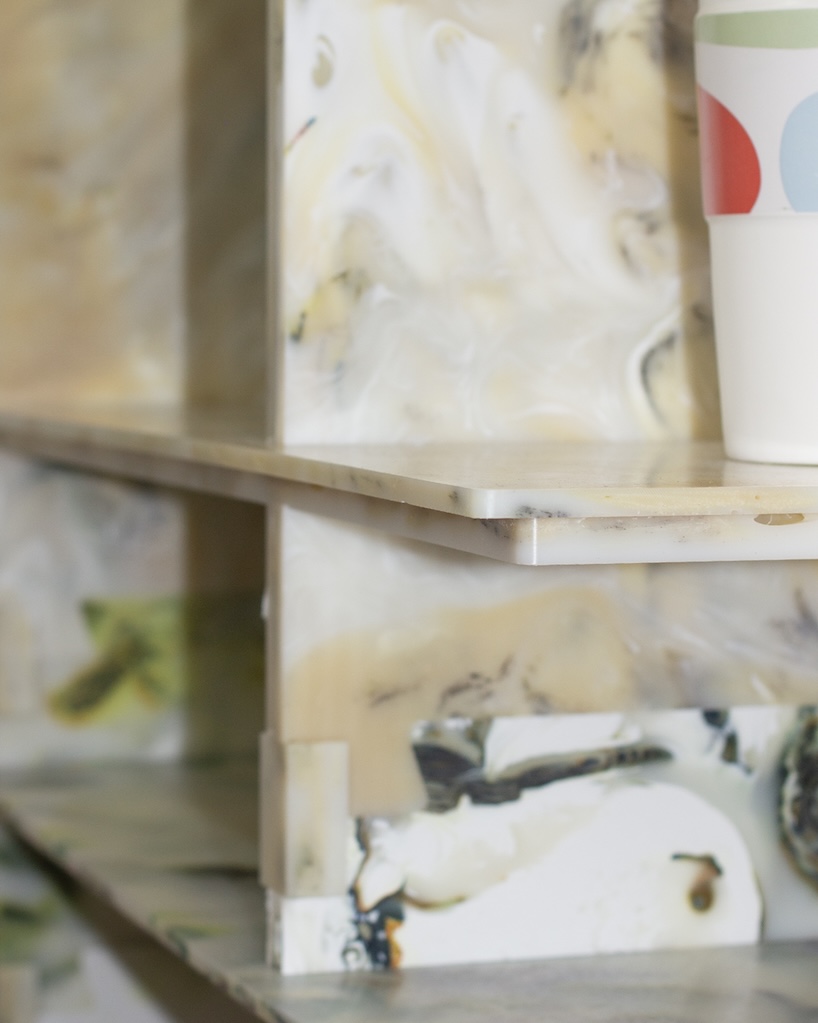 plastic marble display shelf turns upcycled materials into reconfigurable furniture