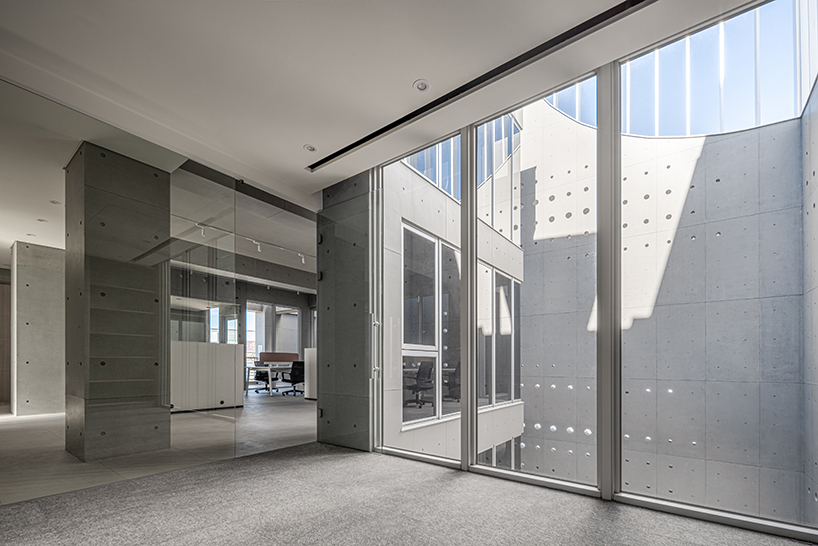 solar locus an interplay of light and shadow in a concreter cubic headquarters in taiwan 4