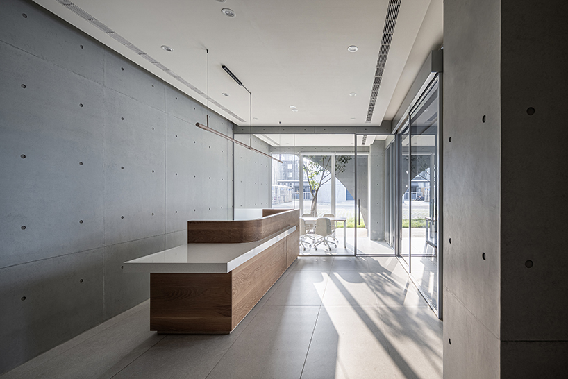 solar locus an interplay of light and shadow in a concreter cubic headquarters in taiwan 5
