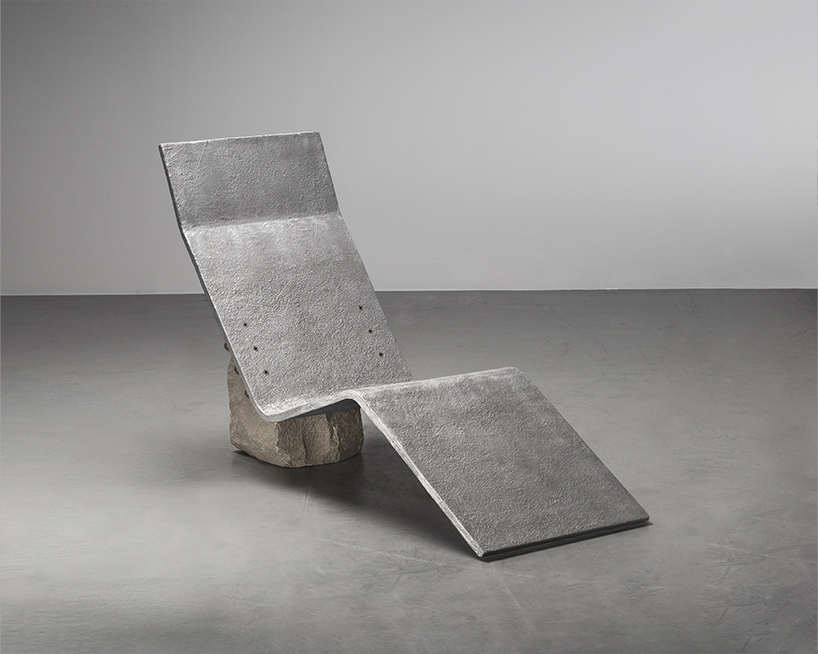 batten and kamp combines textured cast aluminum with rough-cut marble in furniture series