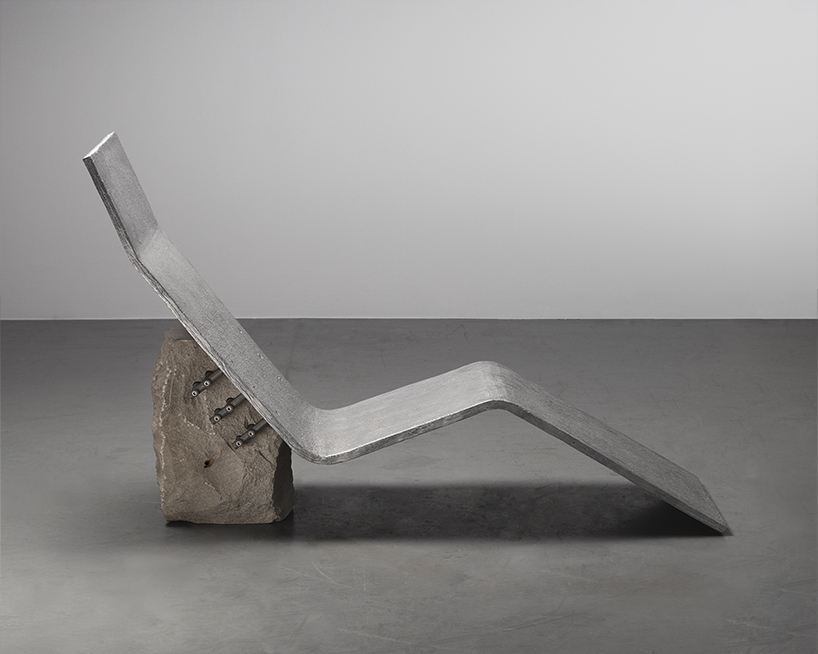 batten and kamp combines textured cast aluminum with rough-cut marble in furniture series