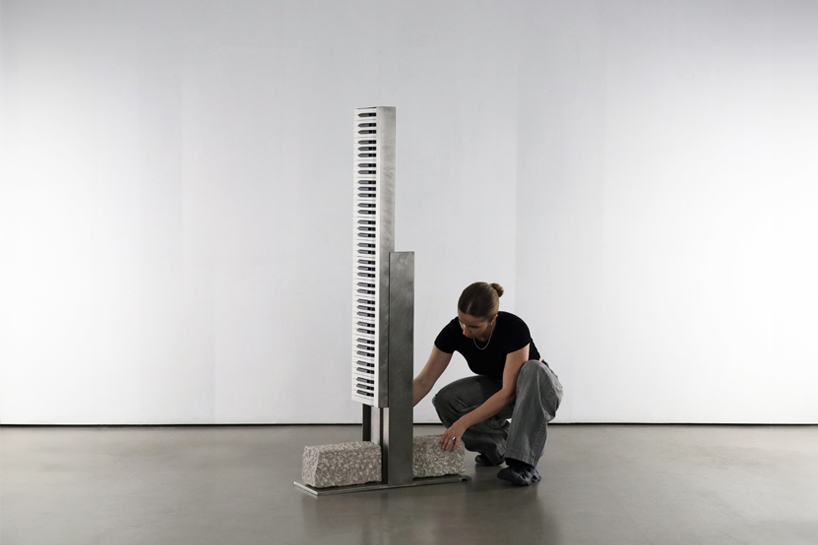 steel and stone piano transforms from electronic instrument to sculptural monolith