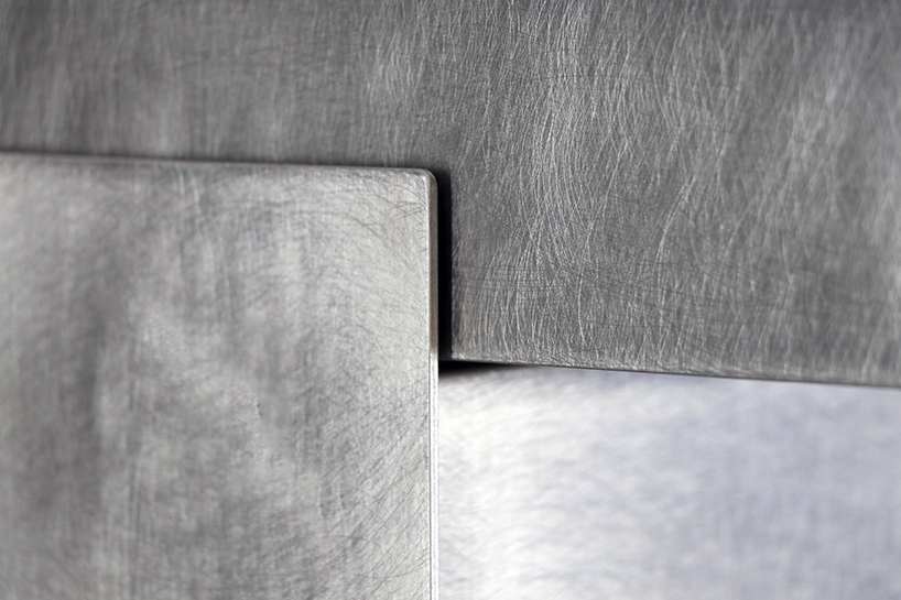 steel and stone piano transforms from electronic instrument to sculptural monolith