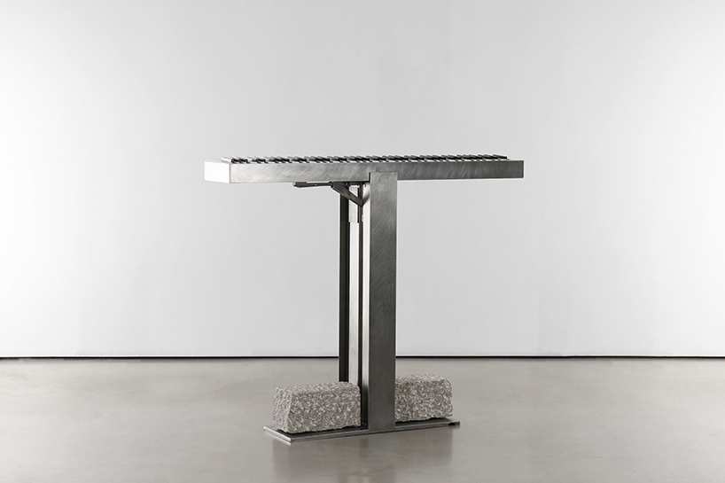 steel and stone piano transforms from electronic instrument to sculptural monolith