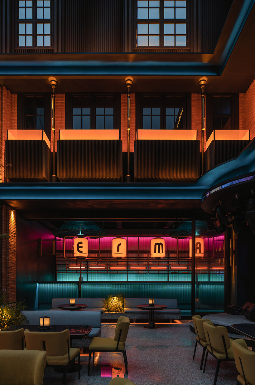 geometrical lines and pops of color create a tipsy night within retro pub in china