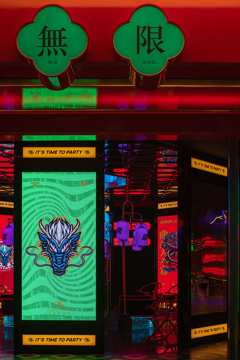 dragon sculpture and eclectic signage illuminate the contemporary Chinese karaoke lounge