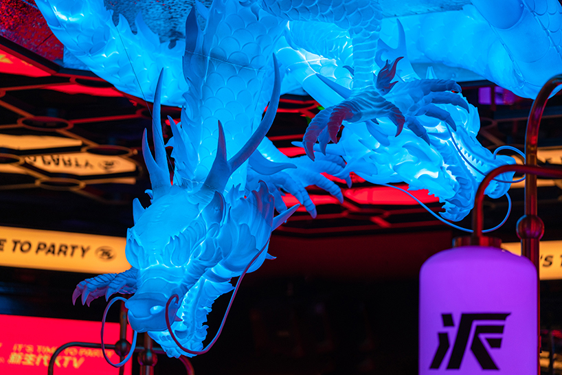 music party ktv 7dragon sculpture and eclectic signage illuminate contemporary karaoke lounge in china