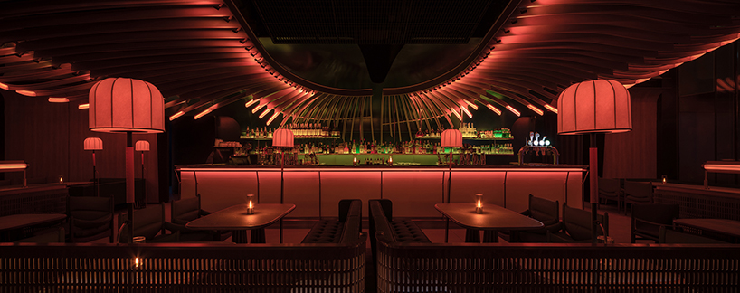 feathered light installation infuses restaurant in china with warm glow