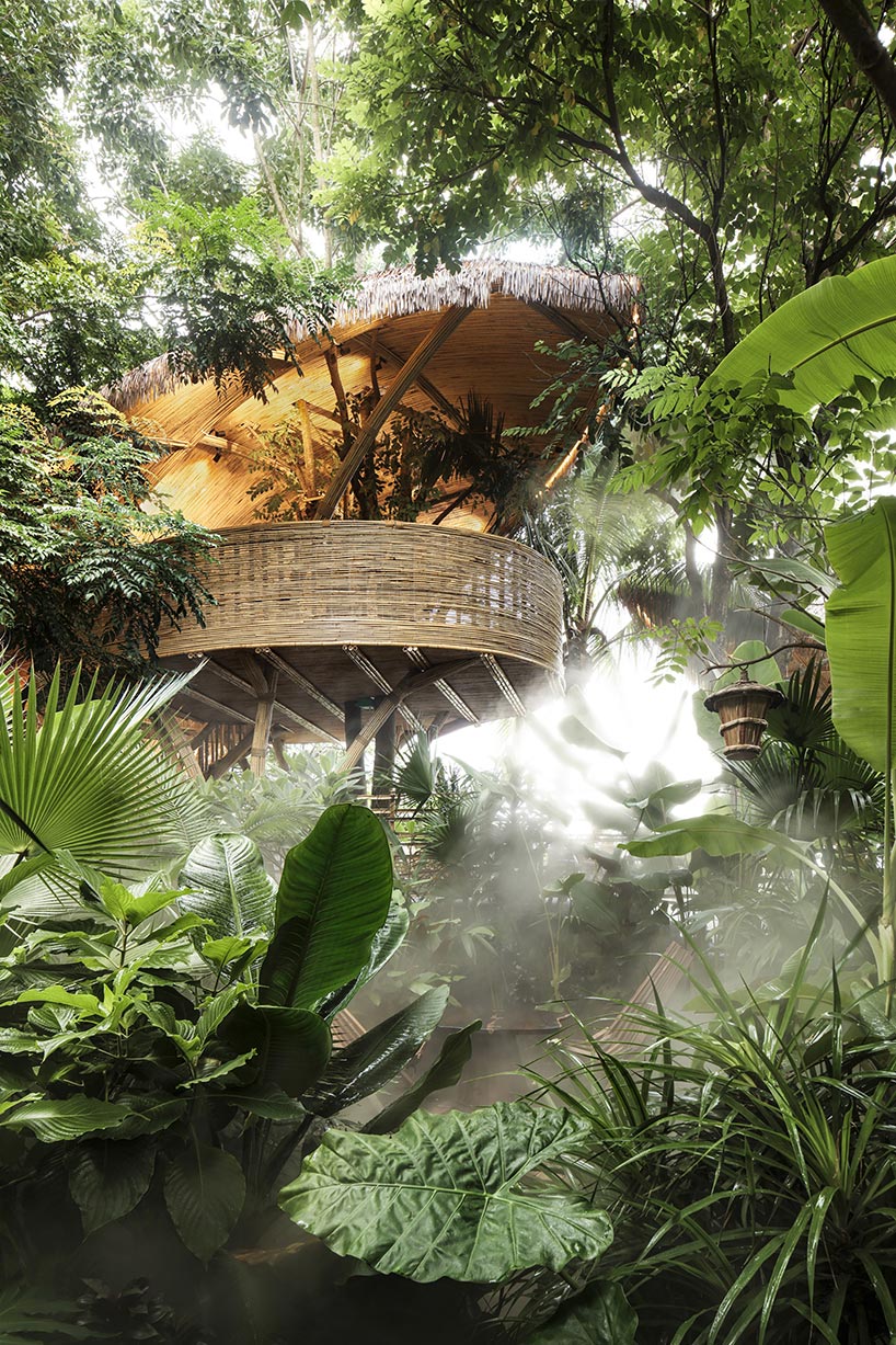 weaved bamboo wraps the floating promenades of spa and restaurant in china