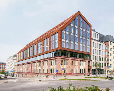 textile factory from 1928 is transformed into an office building with 5 story mass timber frame