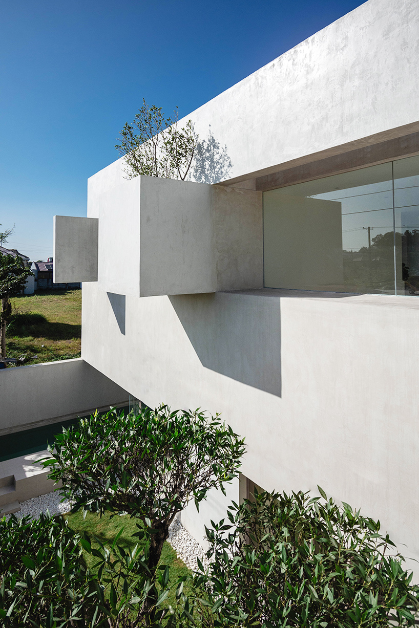 light and air penetrate through the stacked concrete volumes of the Philippines residence