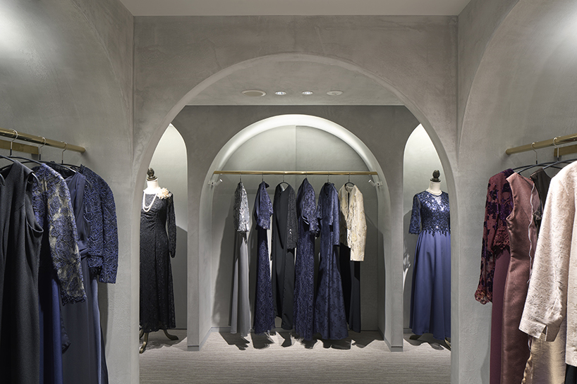 tsutsumi and associates forms labyrinth store in japan with romanesque concrete arches