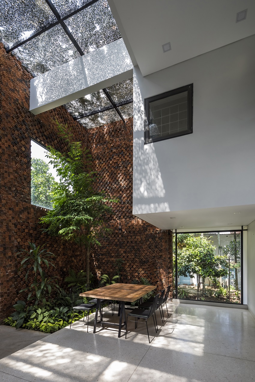 CTA designs a house in vietnam with ‘breathing walls’ to improve indoor air quality designboom