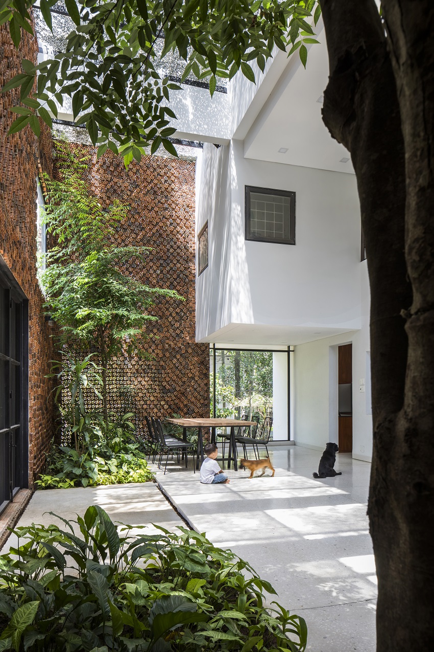 CTA designs a house in vietnam with ‘breathing walls’ to improve indoor air quality designboom