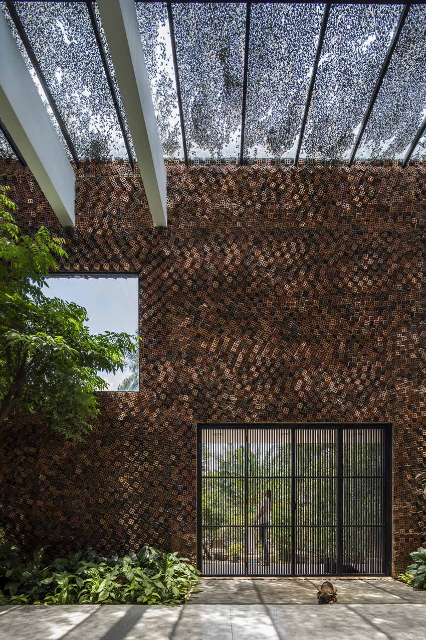 CTA designs a house in vietnam with ‘breathing walls’ to improve indoor air quality designboom