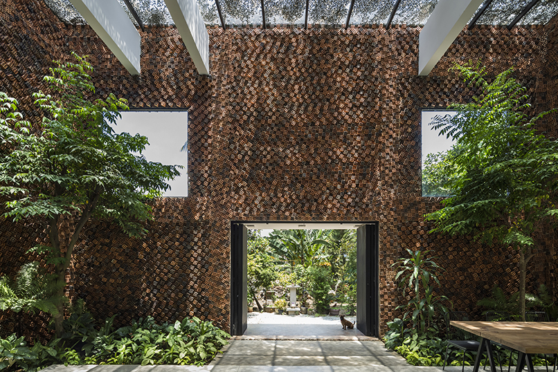 CTA designs a house in vietnam with ‘breathing walls’ to improve indoor air quality designboom