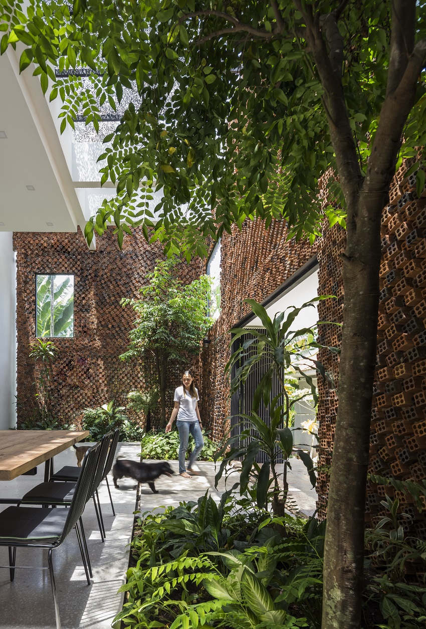 CTA designs a house in vietnam with ‘breathing walls’ to improve indoor air quality designboom