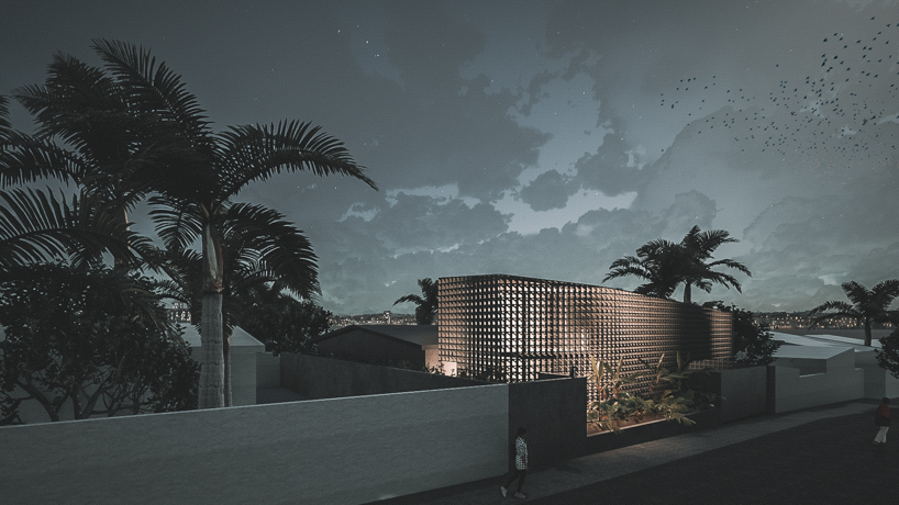 a porous façade of breeze blocks wraps 'dansoman studio' in accra, ghana designboom