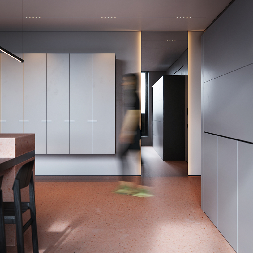 red pigment micro cement surfaces add playful touch to minimalist apartment by OBRIY in ukraine