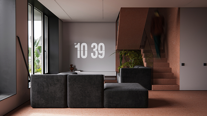 red pigment micro cement surfaces add playful touch to minimalist apartment by OBRIY in ukraine