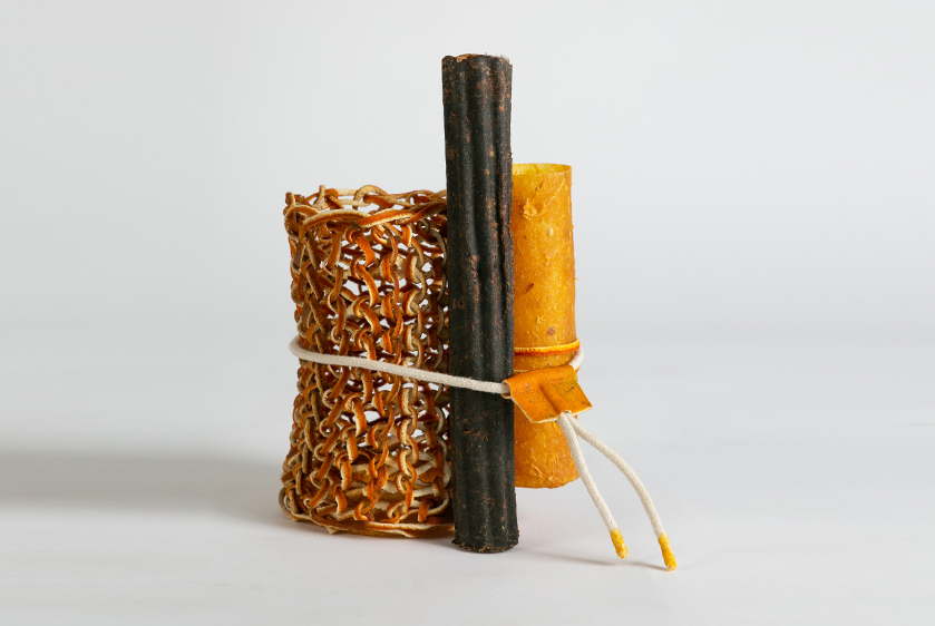 yuli meroz cuts, folds and knits orange peels to create intricate craft creations