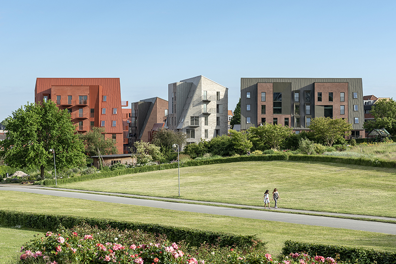 CEBRA designs a 'cozy cobbled streetscape' for aarhus apartments designboom