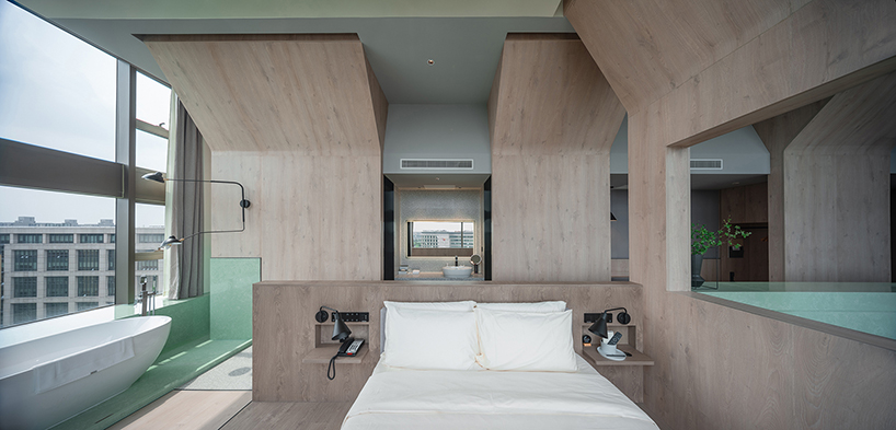 BEHIVE architects designs shanghai hotel around a 7 storey atrium designboom