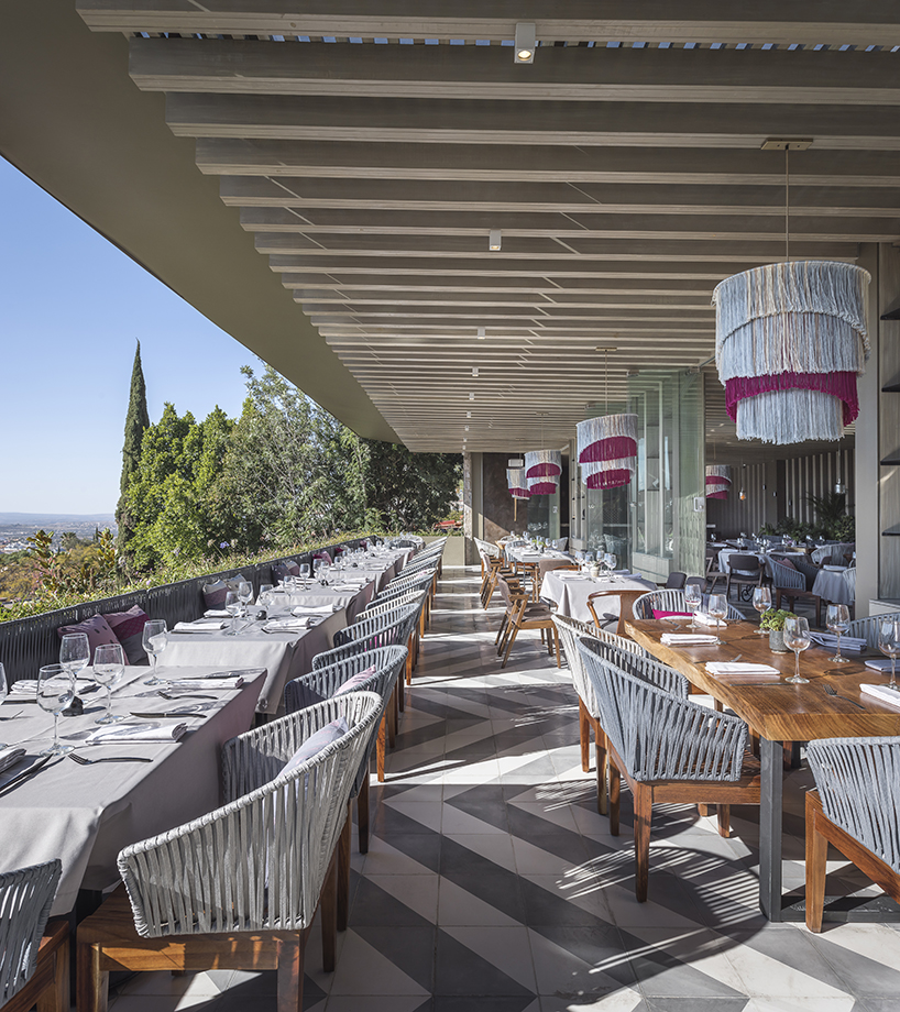 sober elements + natural materials decorate restaurant by faci leboreiro 