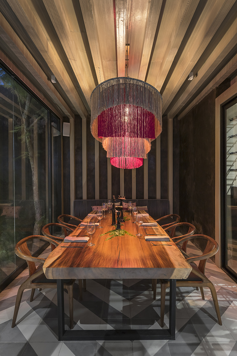 sober elements + natural materials decorate restaurant by faci leboreiro 