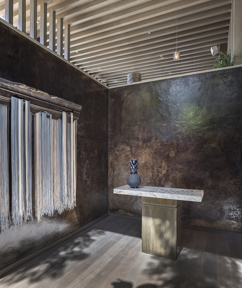 sober elements + natural materials decorate restaurant by faci leboreiro 