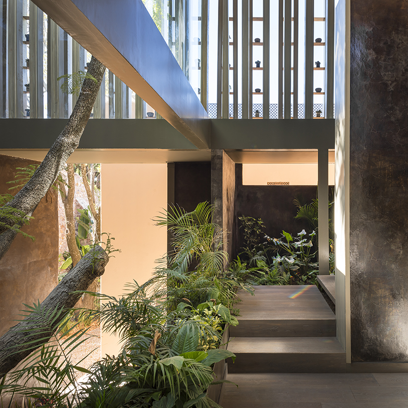 sober elements + natural materials decorate restaurant by faci leboreiro 