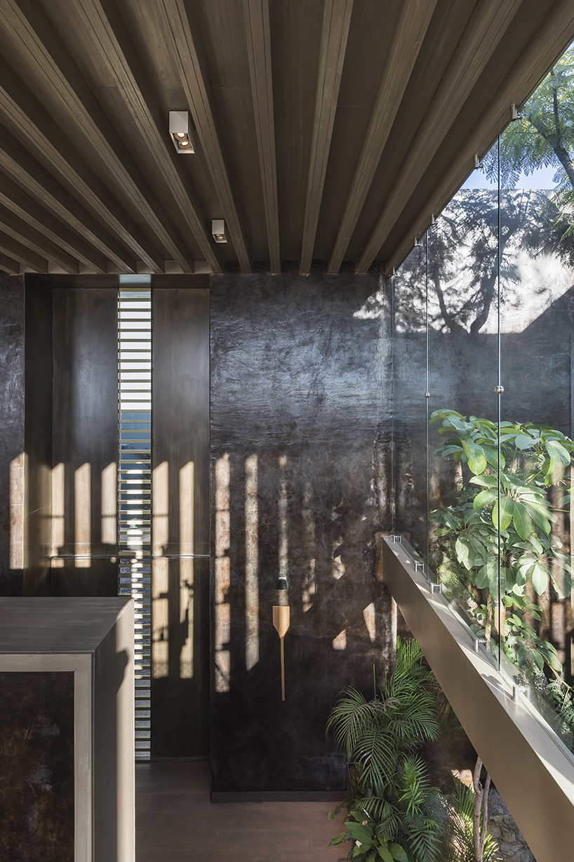 sober elements + natural materials decorate restaurant by faci leboreiro 