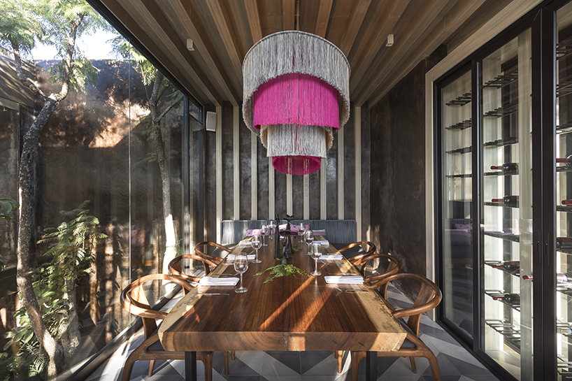 sober elements + natural materials decorate restaurant by faci leboreiro 