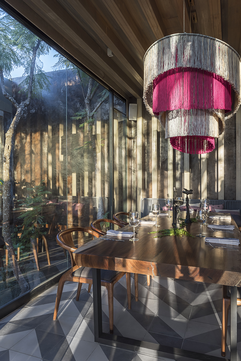 sober elements + natural materials decorate restaurant by faci leboreiro 