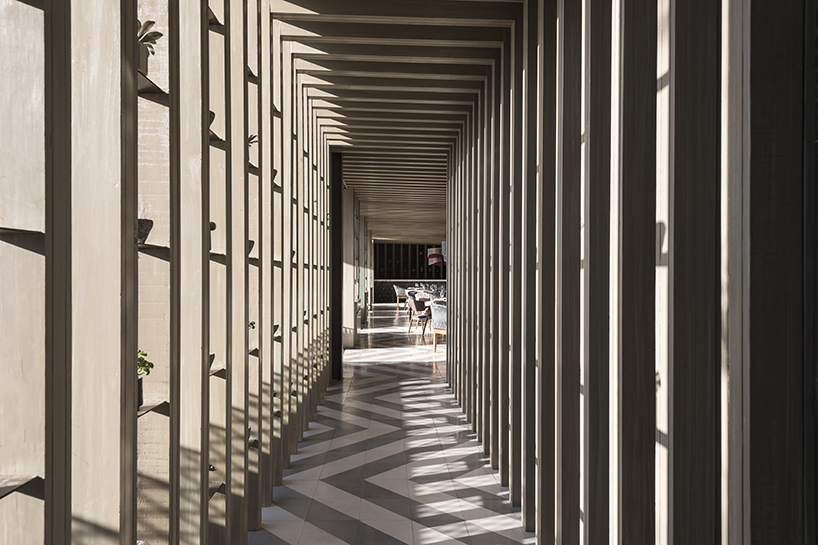 sober elements + natural materials decorate restaurant by faci leboreiro 