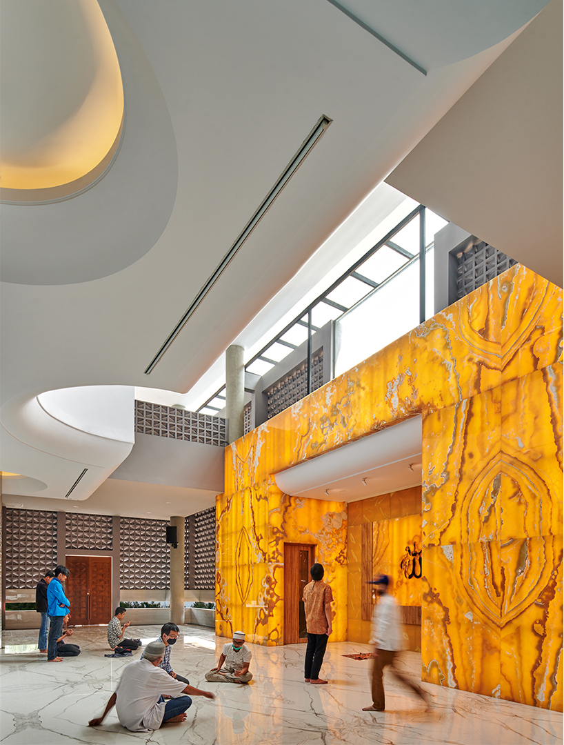 RAD+ar completes bioclimatic mosque in indonesia with perforated brick facade