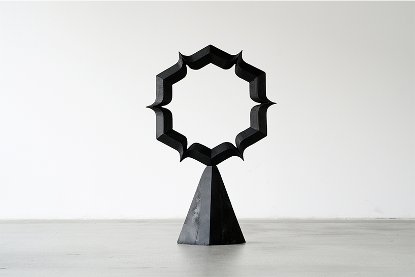 takuto ohta slices into japanese cedar to create sculptural tension for asymptotic wood series