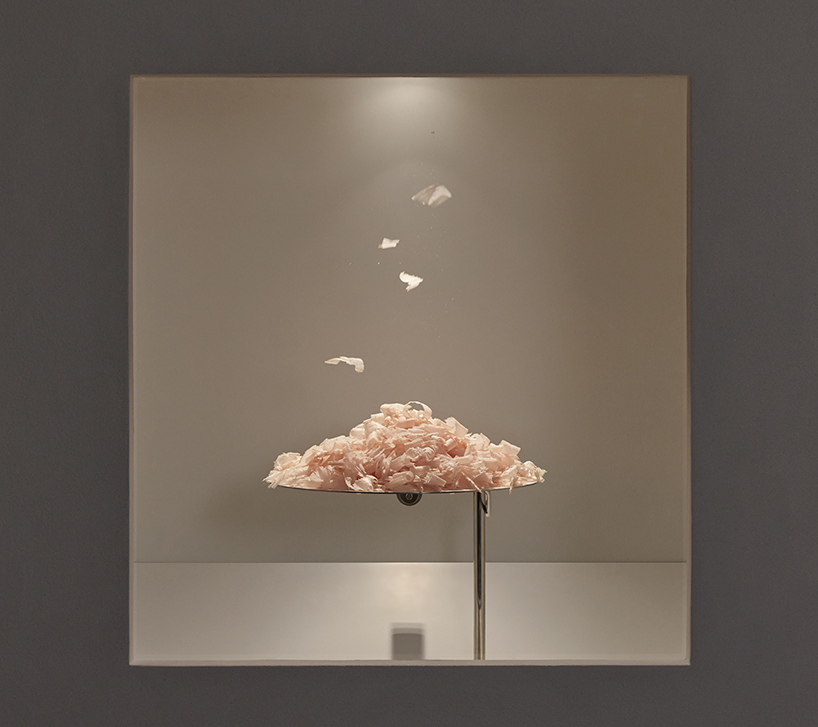 a kinetic installation shaped by shaved bonito flakes forms a continuous display system - 5