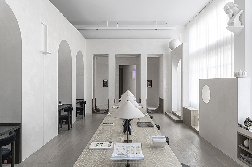 EVD designs own office space in shanghai using a repeating arched motif designboom