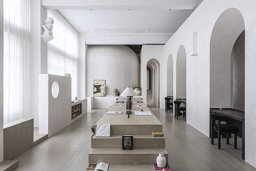 EVD designs own office space in shanghai using a repeating arched motif designboom