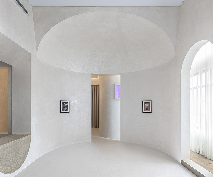 EVD designs own office space in shanghai using a repeating arched motif designboom