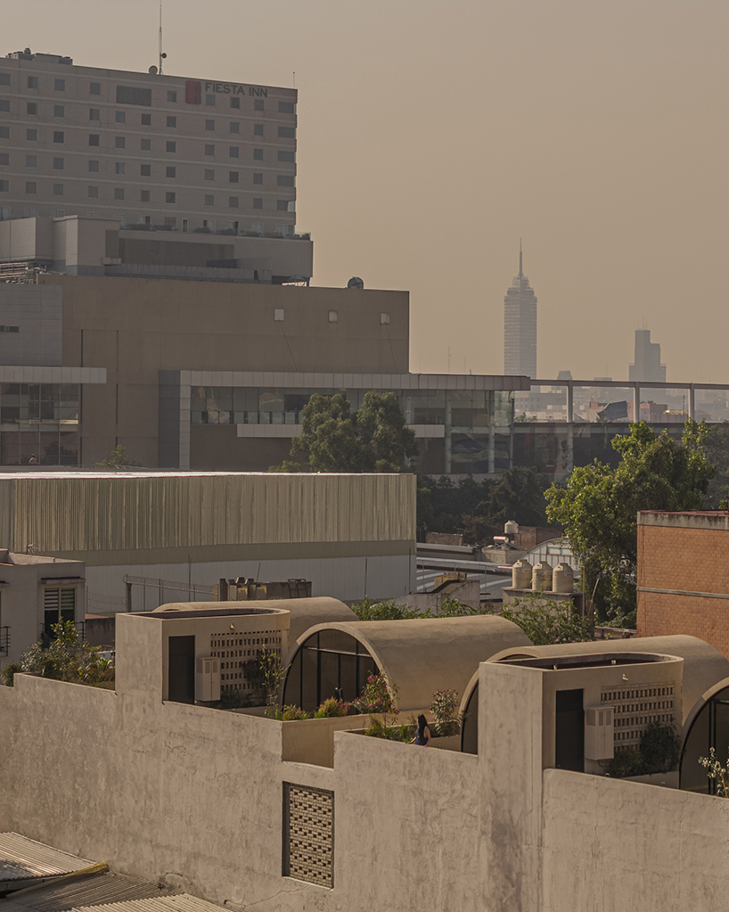four barrel vaults outline residential complex by bloqe arquitectura in mexico city