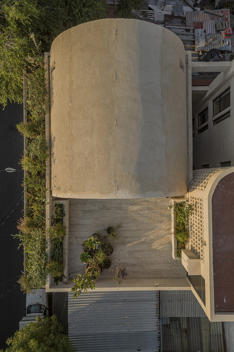 four barrel vaults outline residential complex by bloqe arquitectura in mexico city