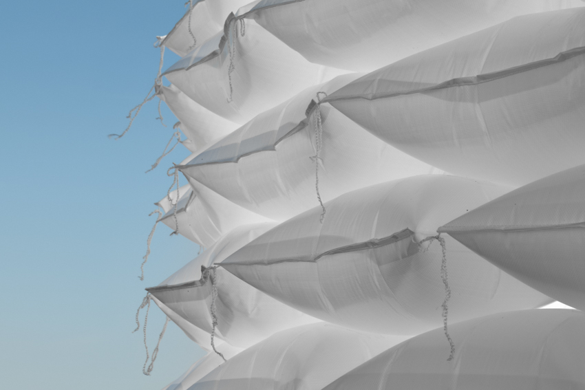 air-filled sandbag installation by gregory orekhov creates soft circular barricade in france