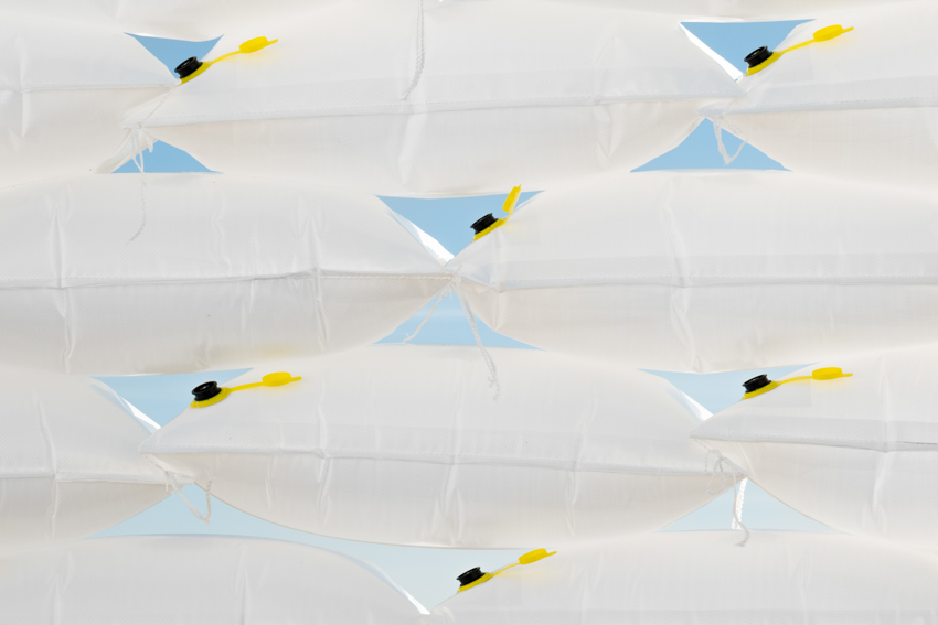 air-filled sandbag installation by gregory orekhov creates soft circular barricade in france