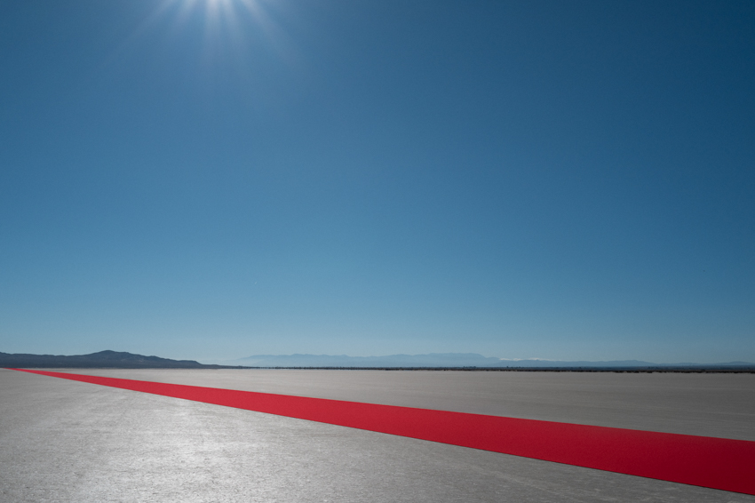 one-kilometer red line land art installation by gregory orekhov spans across california desert
