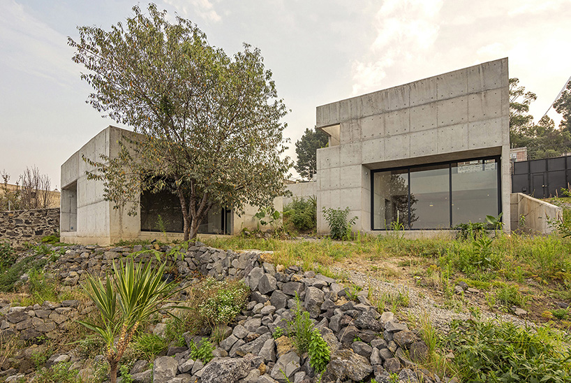 three concrete boxes form 'house colibri' by ViGa arquitectos in mexico city designboom