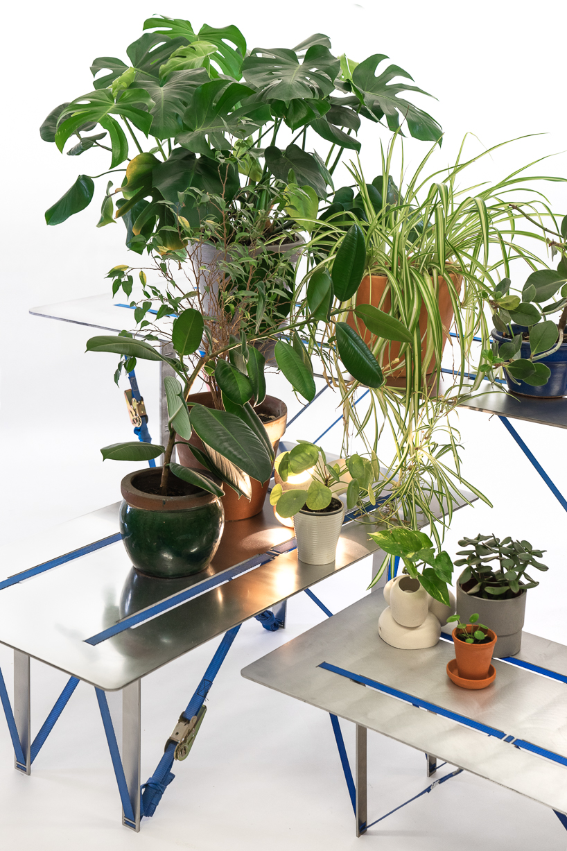 nebbia works combines recycled aluminium and ratchet straps to create 'tighten table' series
