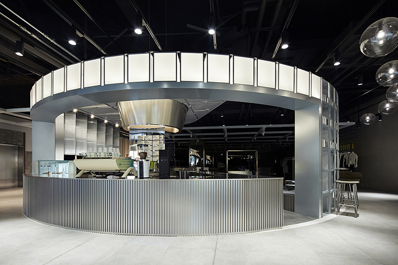 tailor WEY applies cool metallic surfaces to futuristic coffee lab in shanghai designboom