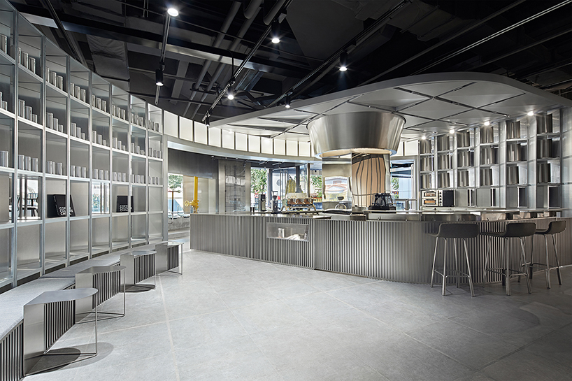 tailor WEY applies cool metallic surfaces to futuristic coffee lab in shanghai designboom